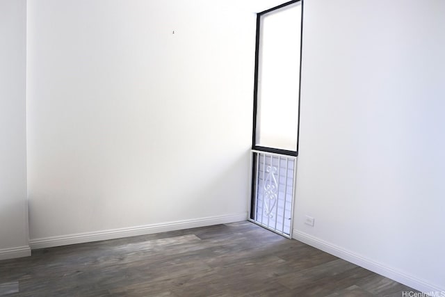 320 Liliuokalani Ave Unit 902, Honolulu, HI 96815 - unfurnished room with baseboards and wood finished floors