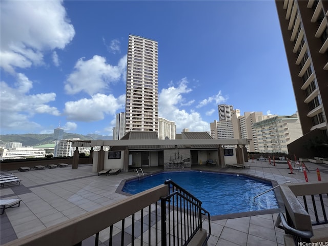 1778 Ala Moana Blvd Unit 3616, Honolulu, HI 96815 - community pool with a patio area, a view of city, and a mountain view