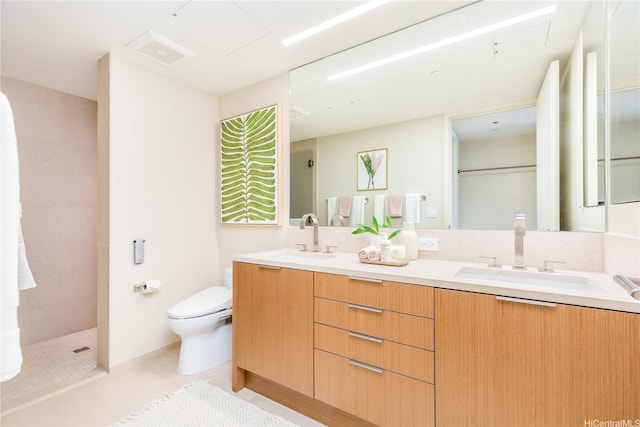 1388 Ala Moana Blvd Unit 1405, Honolulu, HI 96814 - bathroom featuring toilet, tiled shower, double vanity, and tile patterned flooring