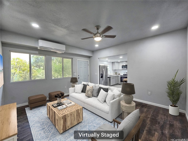 91-444 Pohakupuna Rd, Ewa Beach, HI 96706 - living room with a ceiling fan, baseboards, dark wood-style floors, and a wall mounted air conditioner