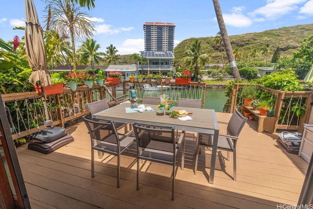 6370 Hawaii Kai Dr Unit 37, Honolulu, HI 96825 - wooden deck featuring a water view and outdoor dining area