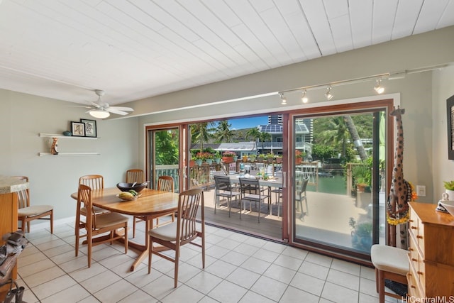 6370 Hawaii Kai Dr Unit 37, Honolulu, HI 96825 - dining area featuring track lighting, light tile patterned floors, healthy amount of natural light, and a ceiling fan