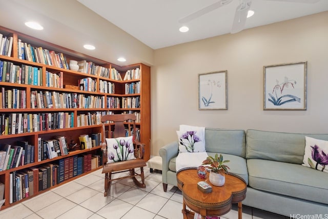 6370 Hawaii Kai Dr Unit 37, Honolulu, HI 96825 - living area featuring tile patterned floors, wall of books, recessed lighting, and a ceiling fan