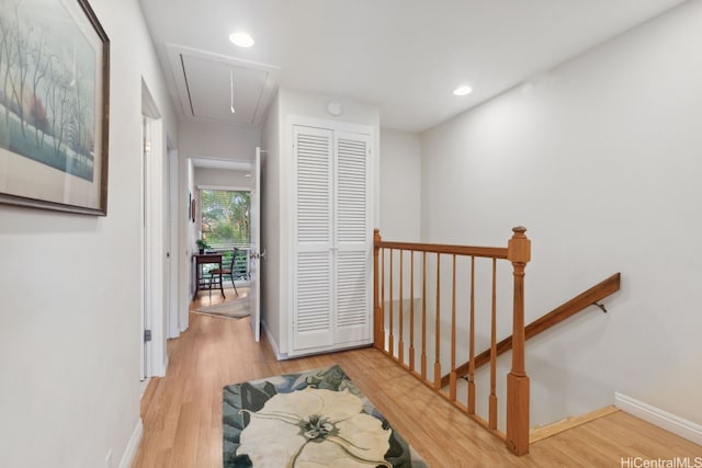 6370 Hawaii Kai Dr Unit 37, Honolulu, HI 96825 - corridor featuring wood finished floors, baseboards, attic access, recessed lighting, and an upstairs landing