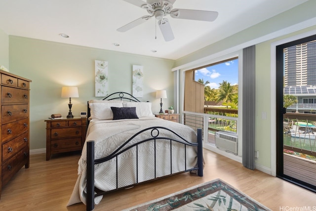 6370 Hawaii Kai Dr Unit 37, Honolulu, HI 96825 - bedroom with ceiling fan, baseboards, cooling unit, access to outside, and light wood-style flooring
