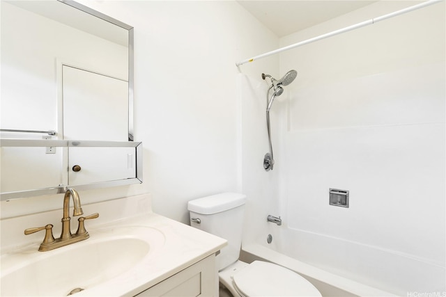 bathroom with toilet, shower / bath combination, and vanity
