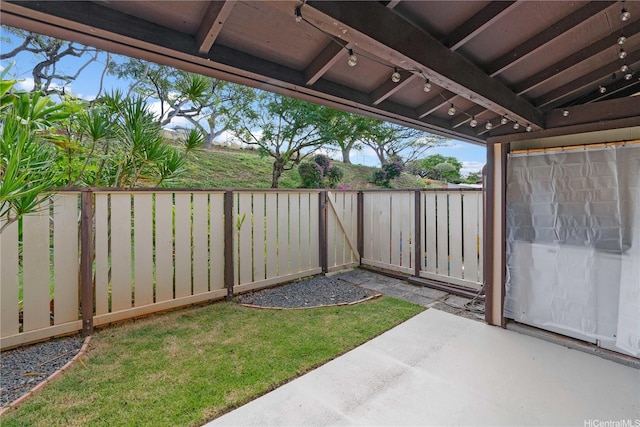 exterior space featuring a fenced backyard
