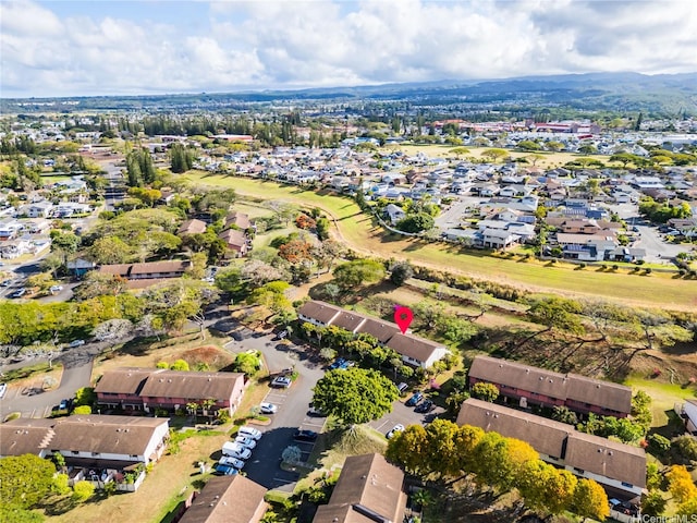 birds eye view of property with a residential view