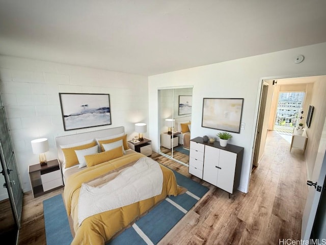 2122 Lime St Unit 604, Honolulu, HI 96826 - bedroom with wood finished floors and a closet