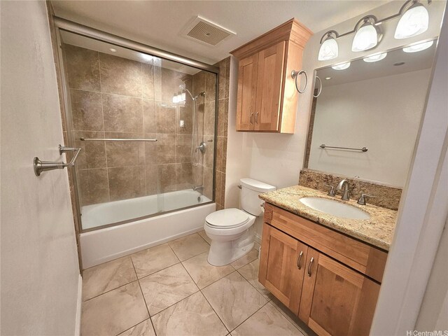 full bath featuring visible vents, toilet, enclosed tub / shower combo, and vanity