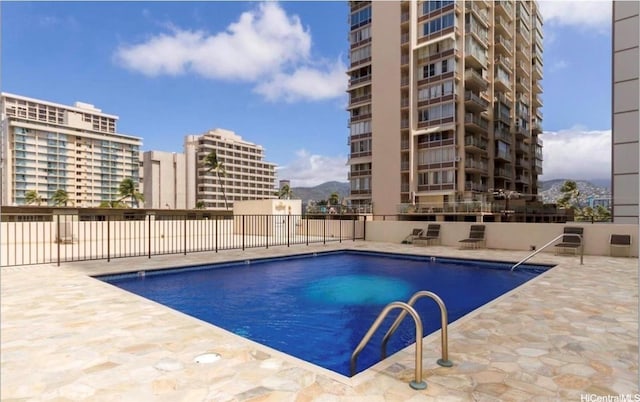 2410 Cleghorn St Unit 502, Honolulu, HI 96815 - pool with a patio, a city view, and fence