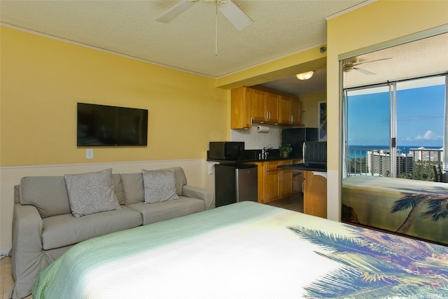 1920 Ala Moana Blvd Unit 2013, Honolulu, HI 96815 - bedroom with ceiling fan, access to outside, a textured ceiling, a sink, and ornamental molding