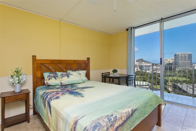 1920 Ala Moana Blvd Unit 2013, Honolulu, HI 96815 - bedroom featuring a view of city, floor to ceiling windows, light tile patterned flooring, and access to exterior