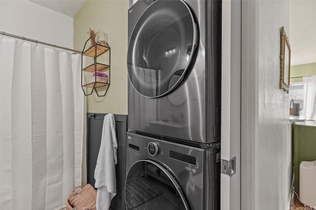 laundry area featuring estacked washer and dryer