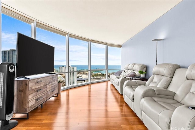 1296 Kapiolani Blvd Unit 3403, Honolulu, HI 96814 - living area featuring floor to ceiling windows and light wood-type flooring