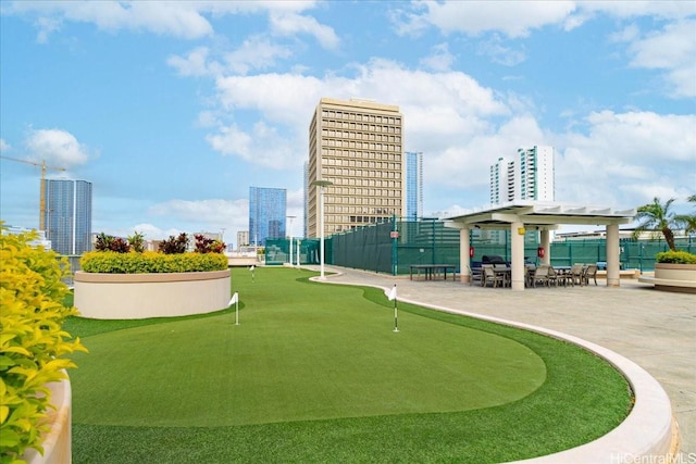 1296 Kapiolani Blvd Unit 3403, Honolulu, HI 96814 - view of community with an area to practice putting, a view of city, and a patio area