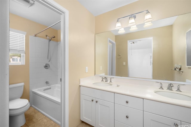 91-2141 Kaiwawalo St, Ewa Beach, HI 96706 - full bath with double vanity, toilet, shower / bath combination, and tile patterned floors