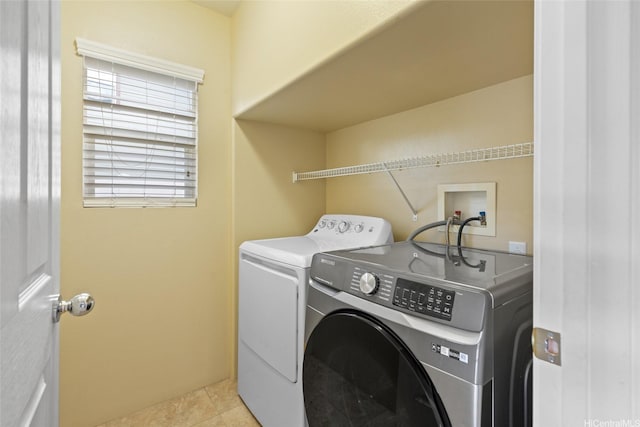 91-2141 Kaiwawalo St, Ewa Beach, HI 96706 - laundry room featuring washer and clothes dryer and light tile patterned flooring