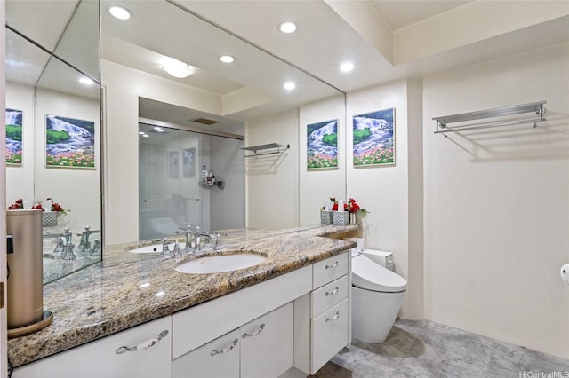 full bath featuring vanity, toilet, recessed lighting, and a stall shower