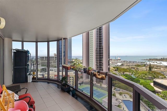 balcony featuring a water view