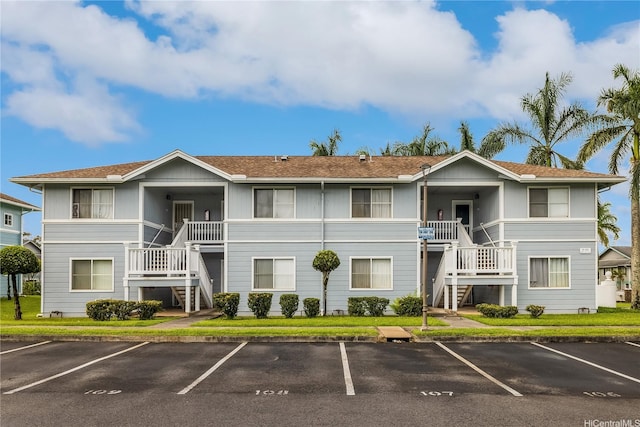 95-1182 Makaikai St Unit 52, Mililani, HI 96789 - view of property with uncovered parking and stairway