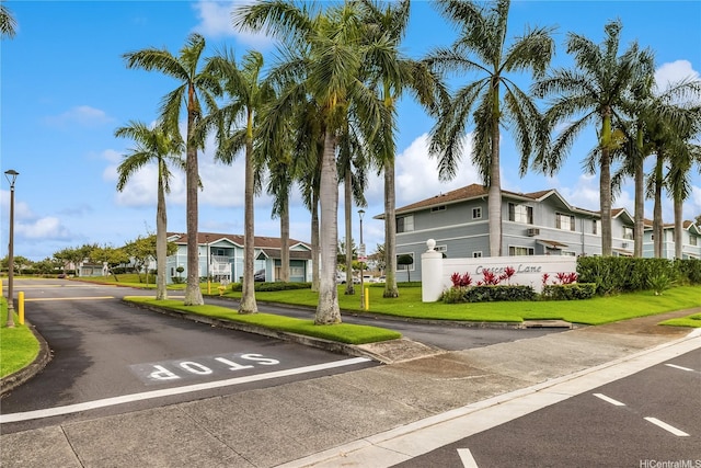 95-1182 Makaikai St Unit 52, Mililani, HI 96789 - exterior space with uncovered parking and a residential view