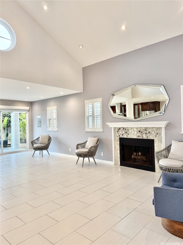 98-1810 Kaahumanu St Unit 3, Pearl City, HI 96782 - living room featuring baseboards, high vaulted ceiling, a fireplace, and recessed lighting