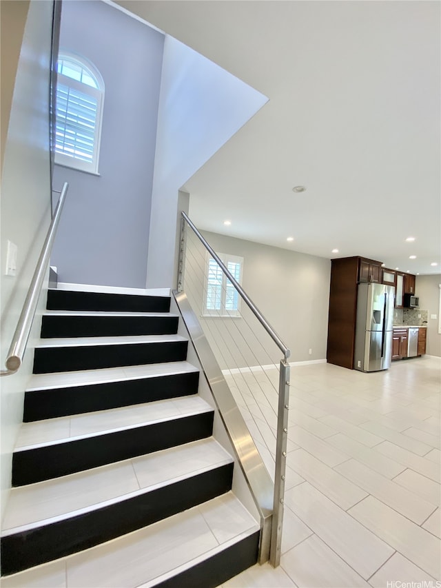 98-1810 Kaahumanu St Unit 3, Pearl City, HI 96782 - staircase featuring recessed lighting, tile patterned floors, and baseboards