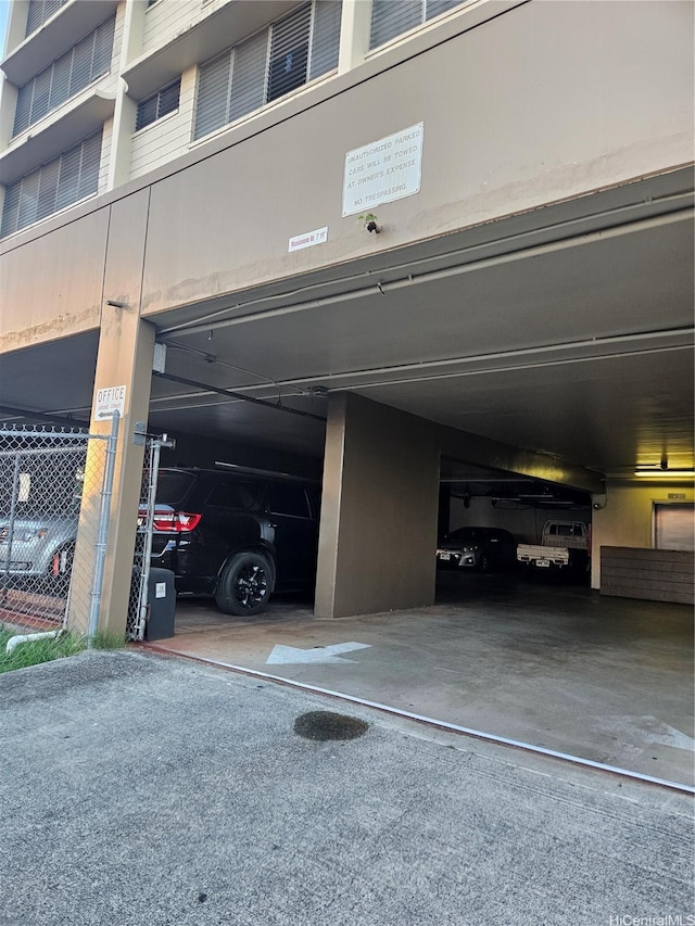 parking deck featuring fence