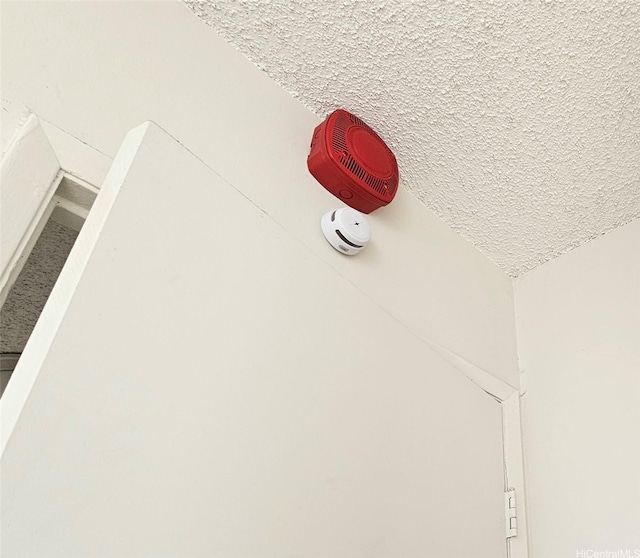 interior details with a textured ceiling