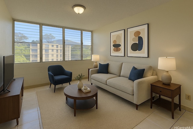 living area with light tile patterned floors and plenty of natural light