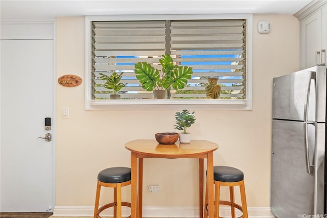 236 Liliuokalani Ave Unit 201, Honolulu, HI 96815 - dining area with baseboards
