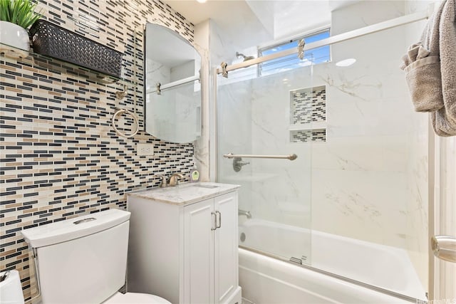 236 Liliuokalani Ave Unit 201, Honolulu, HI 96815 - full bathroom featuring enclosed tub / shower combo, vanity, and tile walls