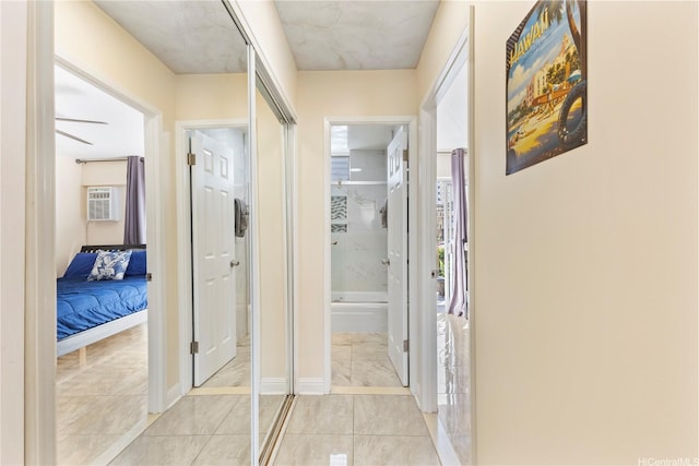 236 Liliuokalani Ave Unit 201, Honolulu, HI 96815 - hallway with a wall unit AC and plenty of natural light