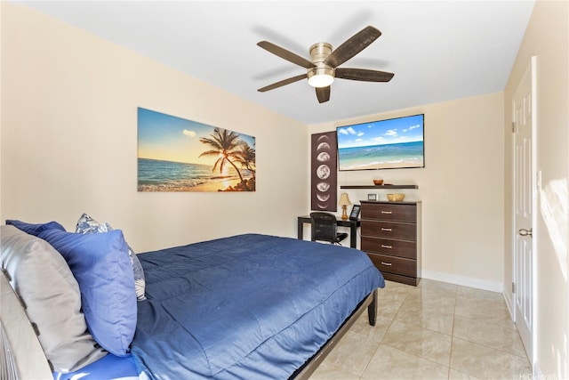 236 Liliuokalani Ave Unit 201, Honolulu, HI 96815 - bedroom featuring a ceiling fan and baseboards