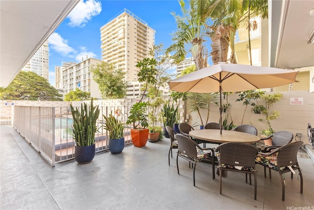 236 Liliuokalani Ave Unit 201, Honolulu, HI 96815 - view of patio / terrace with outdoor dining area and a city view