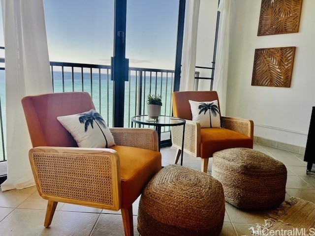 balcony featuring a water view