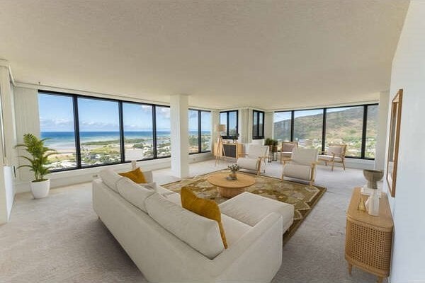 250 Kawaihae St Unit 15B, Honolulu, HI 96825 - living room featuring carpet flooring, expansive windows, and a healthy amount of sunlight