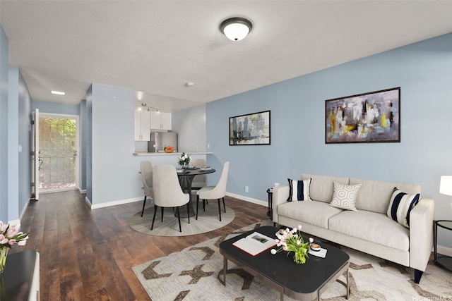 92-905 Hame Pl Unit 19-101, Kapolei, HI 96707 - living room with wood finished floors and baseboards