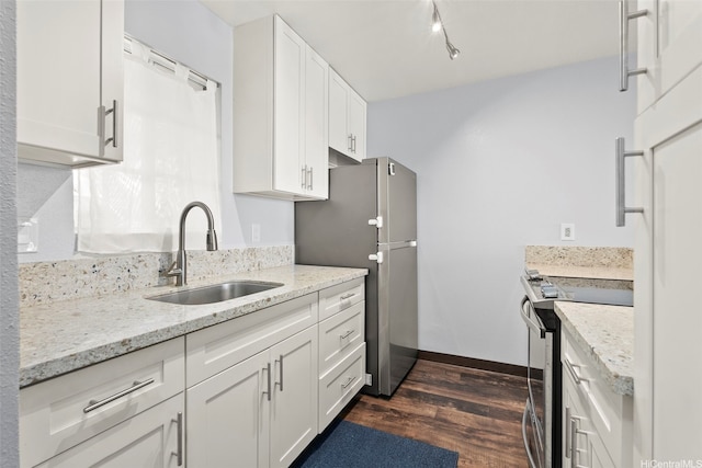 92-905 Hame Pl Unit 19-101, Kapolei, HI 96707 - kitchen featuring a sink, stainless steel appliances, dark wood-style floors, white cabinets, and light stone countertops