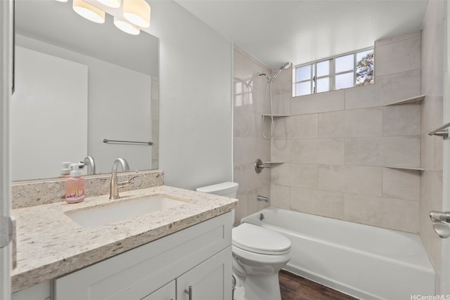 92-905 Hame Pl Unit 19-101, Kapolei, HI 96707 - full bath featuring wood finished floors, toilet, vanity, and bathing tub / shower combination