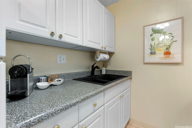 98-1038 Moanalua Rd Unit 1502, Aiea, HI 96701 - kitchen featuring a sink, white cabinets, and light countertops