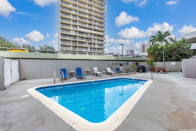 2542 Date St Unit 904, Honolulu, HI 96826 - pool featuring a patio and fence