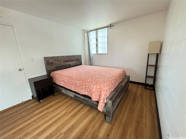 1624 Dole St Unit 303, Honolulu, HI 96822 - bedroom with wood finished floors
