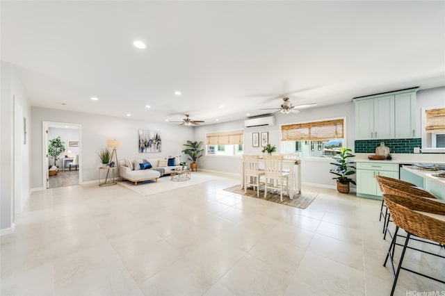 91-865 Ma Ke Kula St, Ewa Beach, HI 96706 - living room featuring a wall mounted air conditioner, ceiling fan, recessed lighting, and baseboards