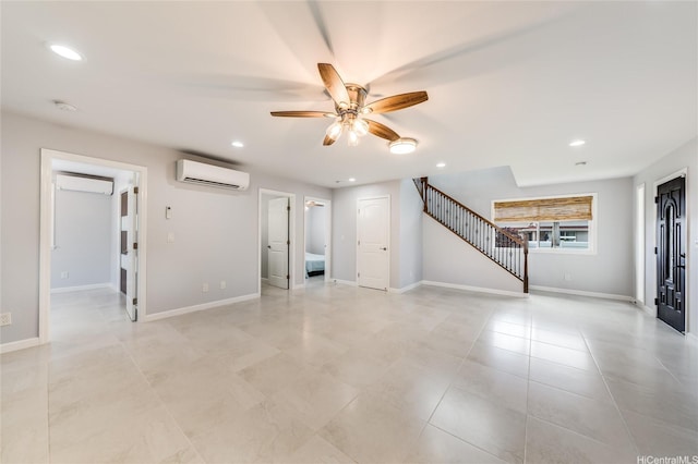 91-865 Ma Ke Kula St, Ewa Beach, HI 96706 - unfurnished living room featuring an AC wall unit, ceiling fan, a wall unit AC, stairway, and recessed lighting