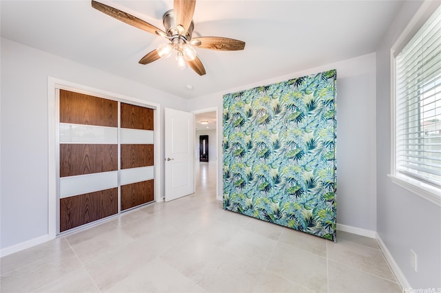 91-865 Ma Ke Kula St, Ewa Beach, HI 96706 - empty room with a ceiling fan and baseboards