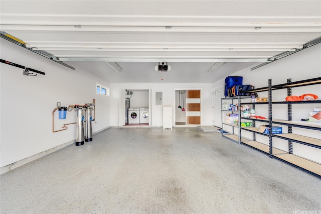 91-865 Ma Ke Kula St, Ewa Beach, HI 96706 - garage featuring independent washer and dryer, a garage door opener, and electric panel