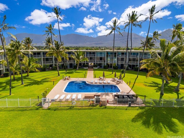 87-561 Farrington Hwy Unit 315, Waianae, HI 96792 - community pool with a lawn, a patio, fence private yard, and a mountain view