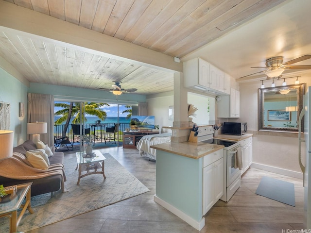 87-561 Farrington Hwy Unit 315, Waianae, HI 96792 - kitchen featuring white appliances, a ceiling fan, white cabinetry, wood ceiling, and open floor plan